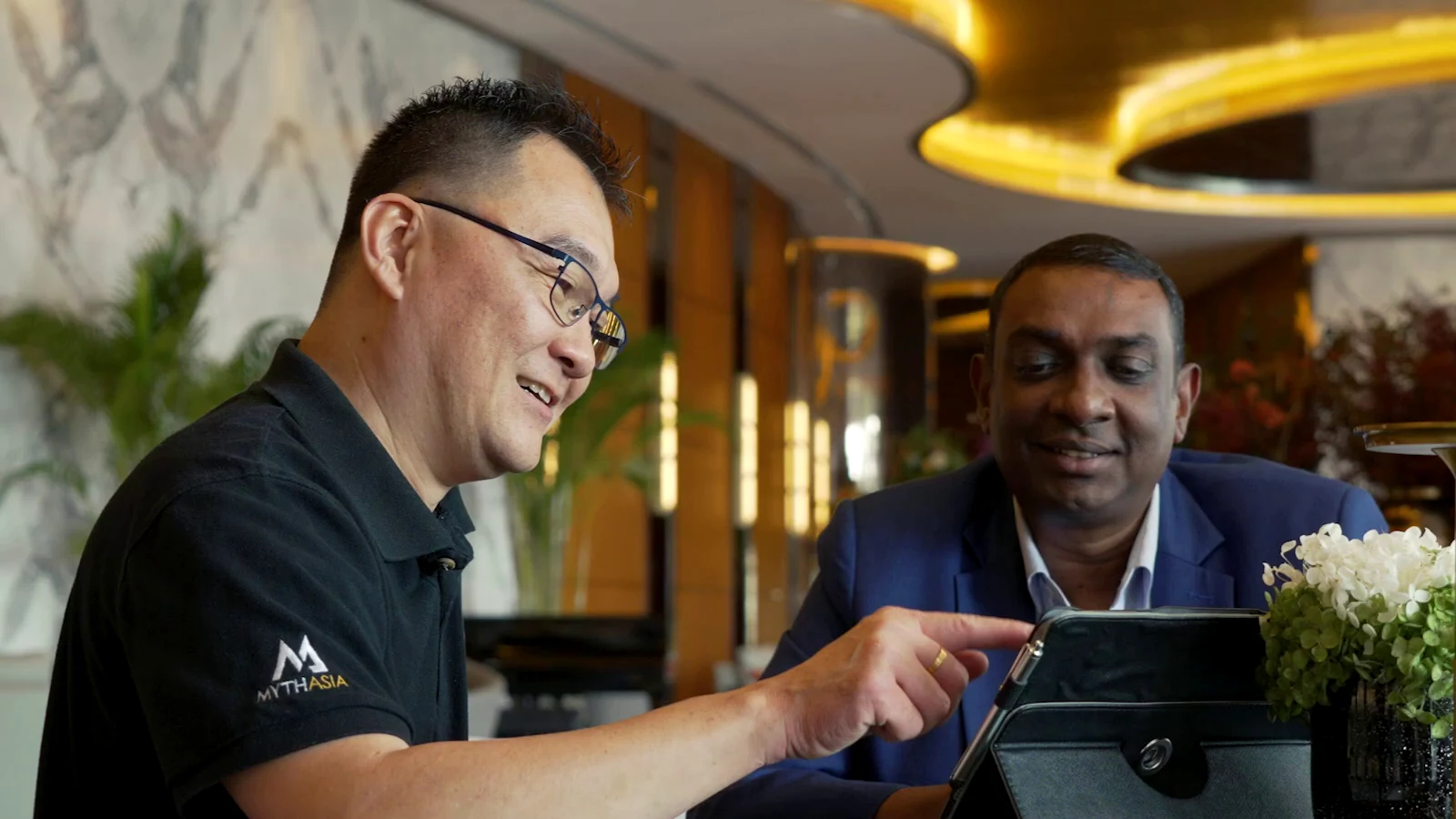 Hotel operations team reviewing a digital workflow together