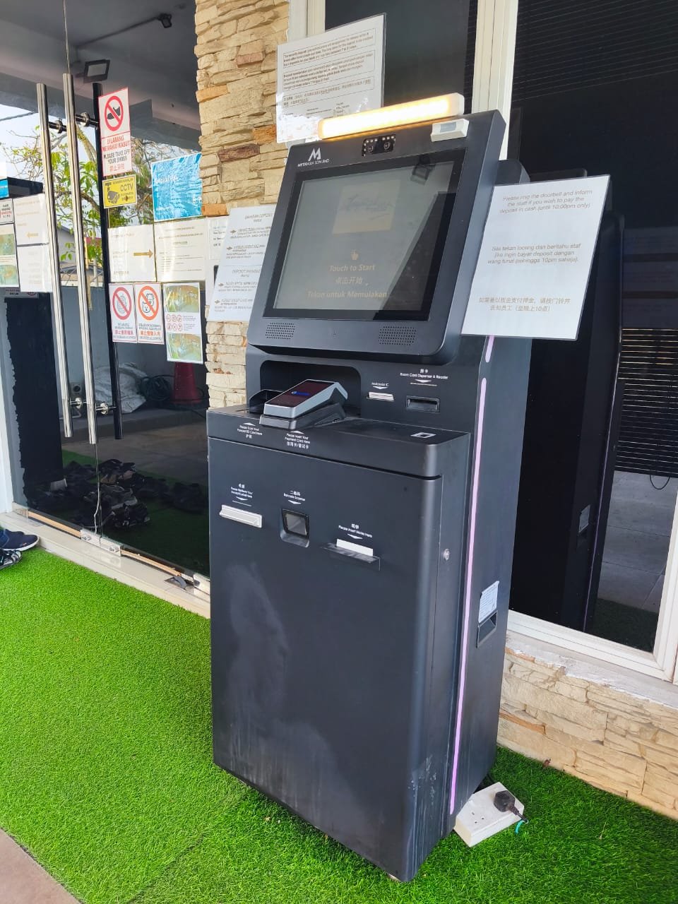 Angled view of the installed Classic Kiosk M150 at Tropical Villa Kuantan